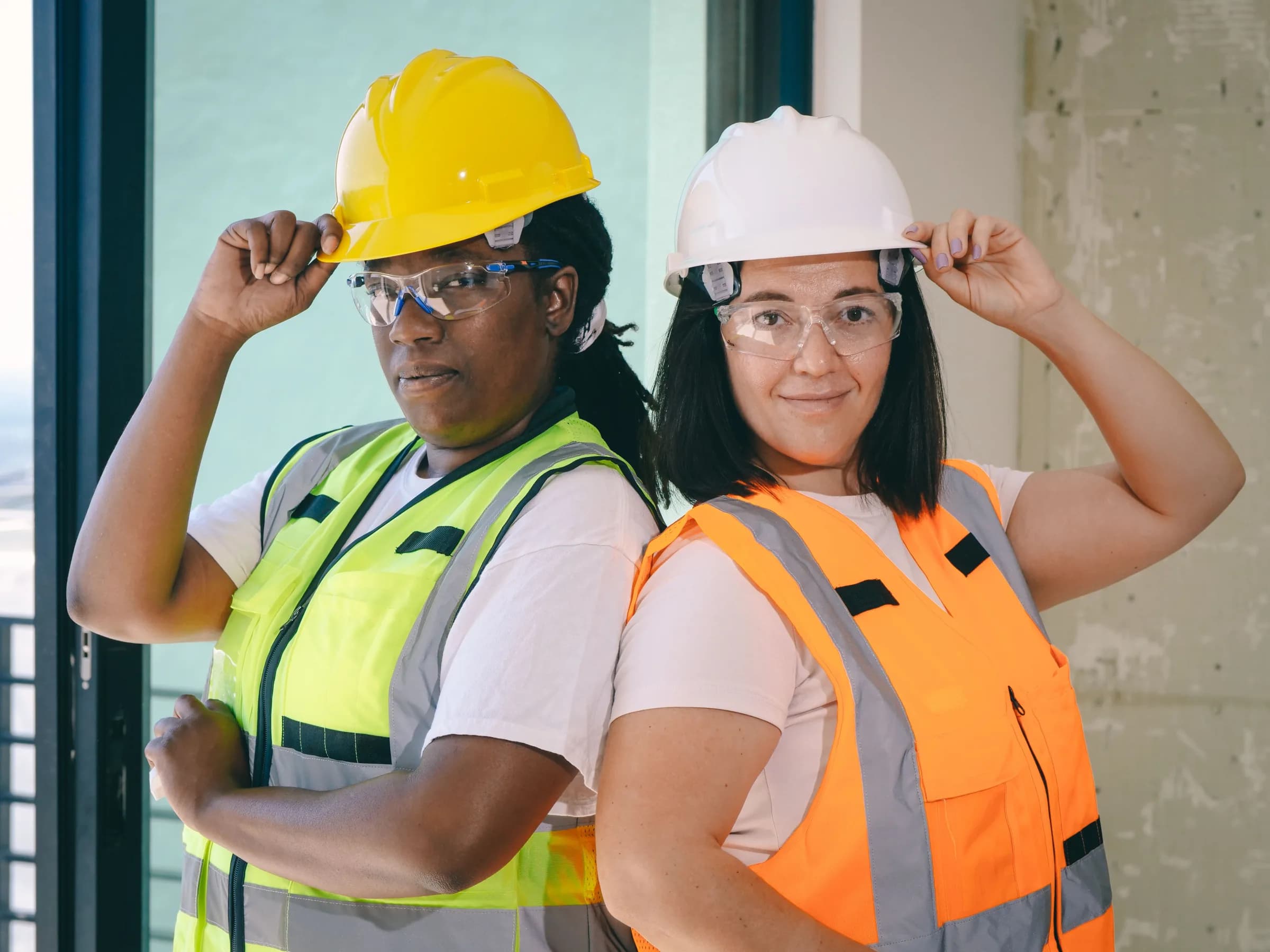 Workers wearing safety helmets at a worksite